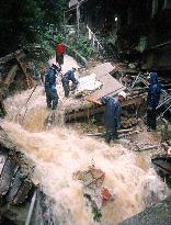 Heavy rain brings floods, landslides northeast of Tokyo